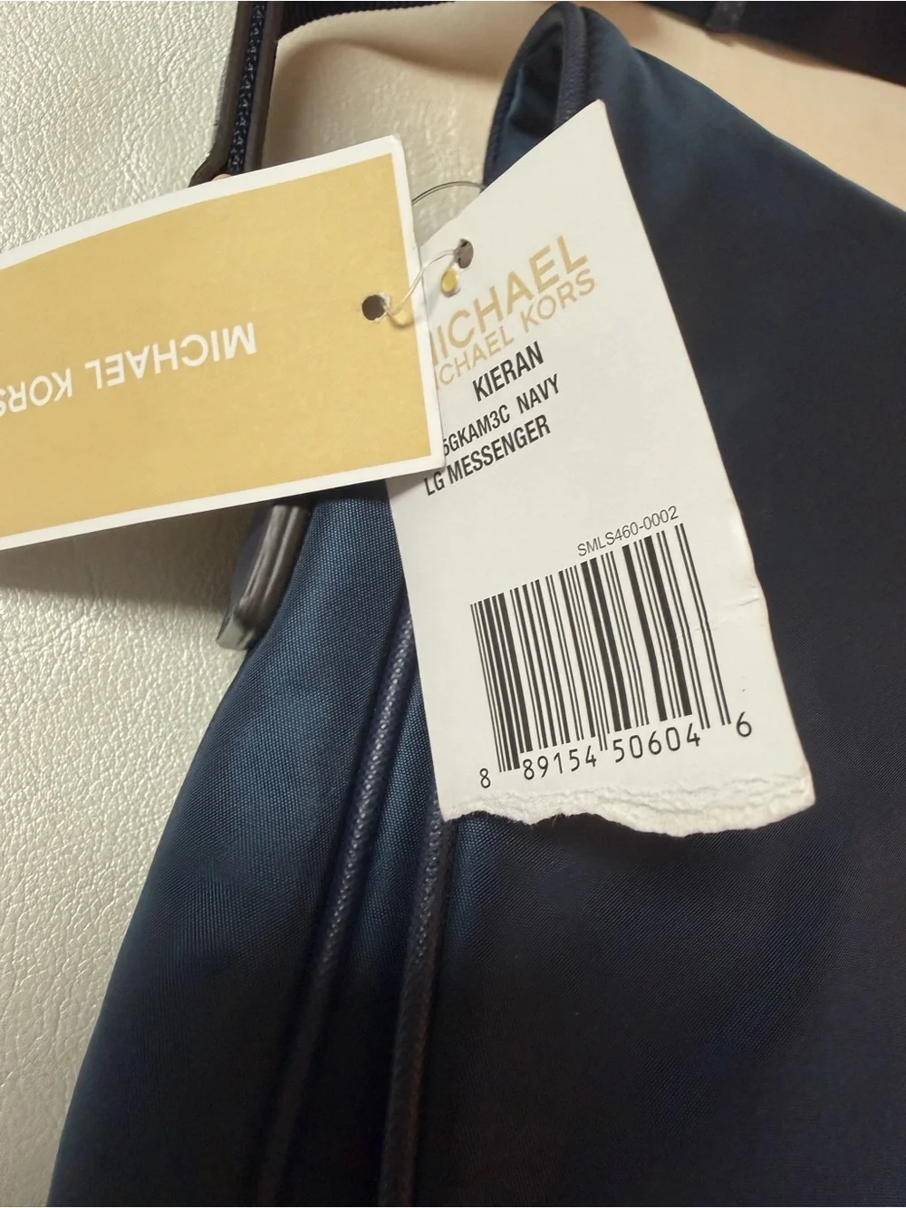 Michael Kors Navy Messenger Bag with Gold Logo
